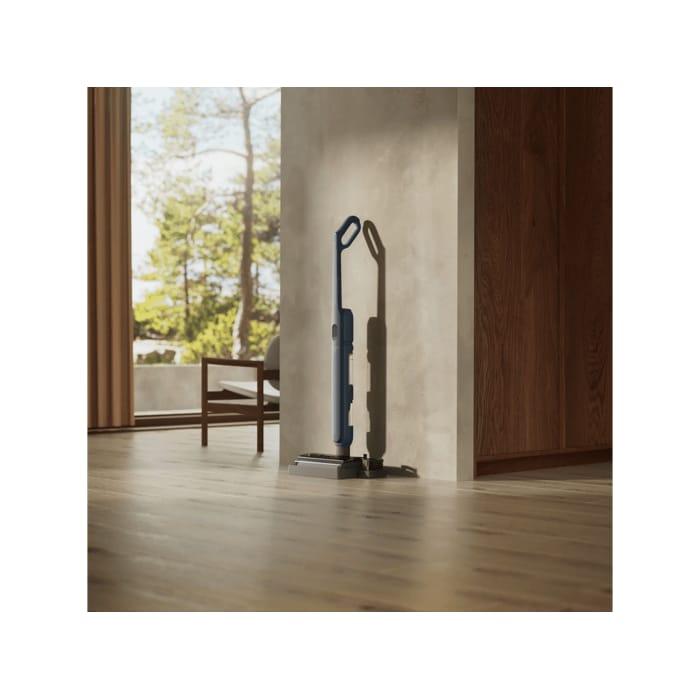 Vacuum cleaner in use in a home environment