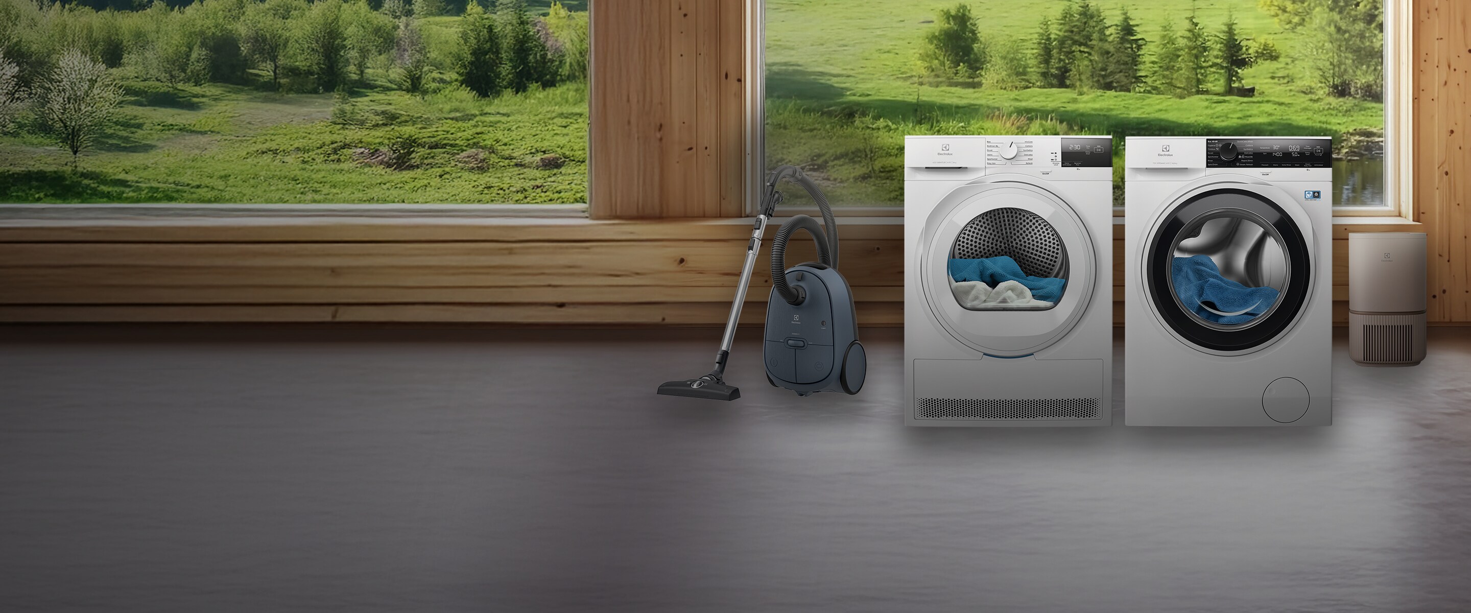 Electrolux buitiniai prietaisai, pievų ir medžių fone