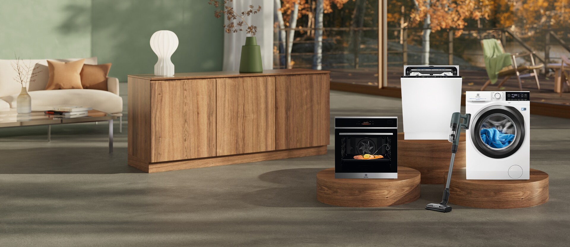 „Electrolux“ buitinė technika moderniame interjere ant pakylų: orkaitė, indaplovė, skalbyklė ir belaidis dulkių siurblys.